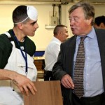 Kenneth Clarke, then justice secretary, talks to an inmate at Peterborough prison in 2010